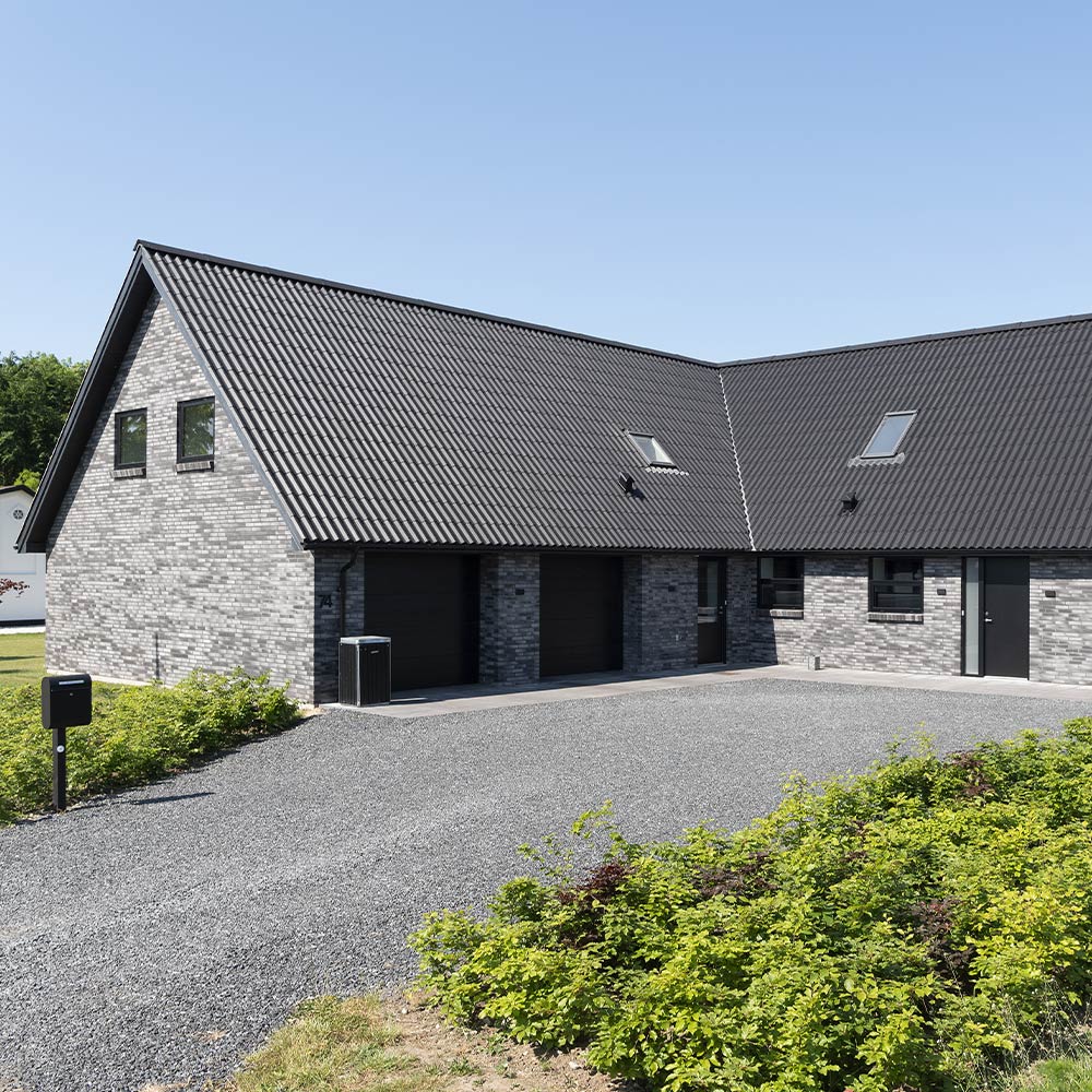 Sorte B6 tagplader som b&oslash;lgeplader