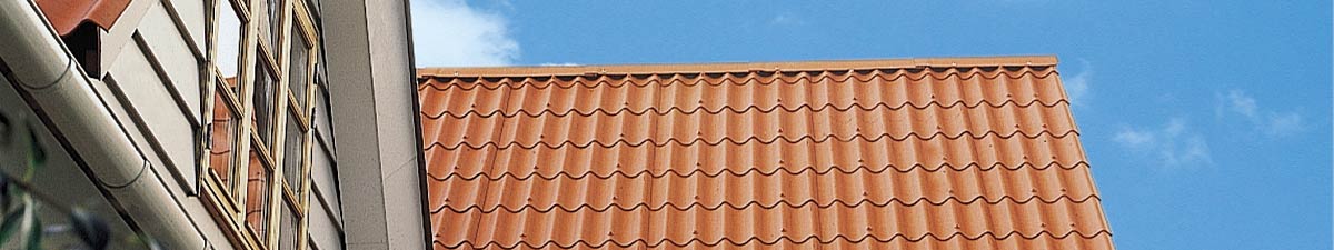 Tagrenovering med r&oslash;de B5 b&oslash;lgeplader