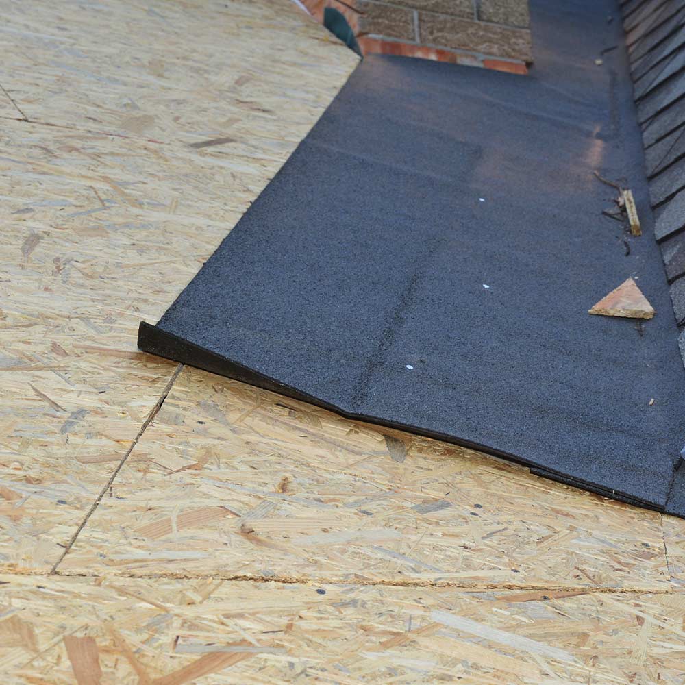 Tagpap p&aring; tag af krydsfiner